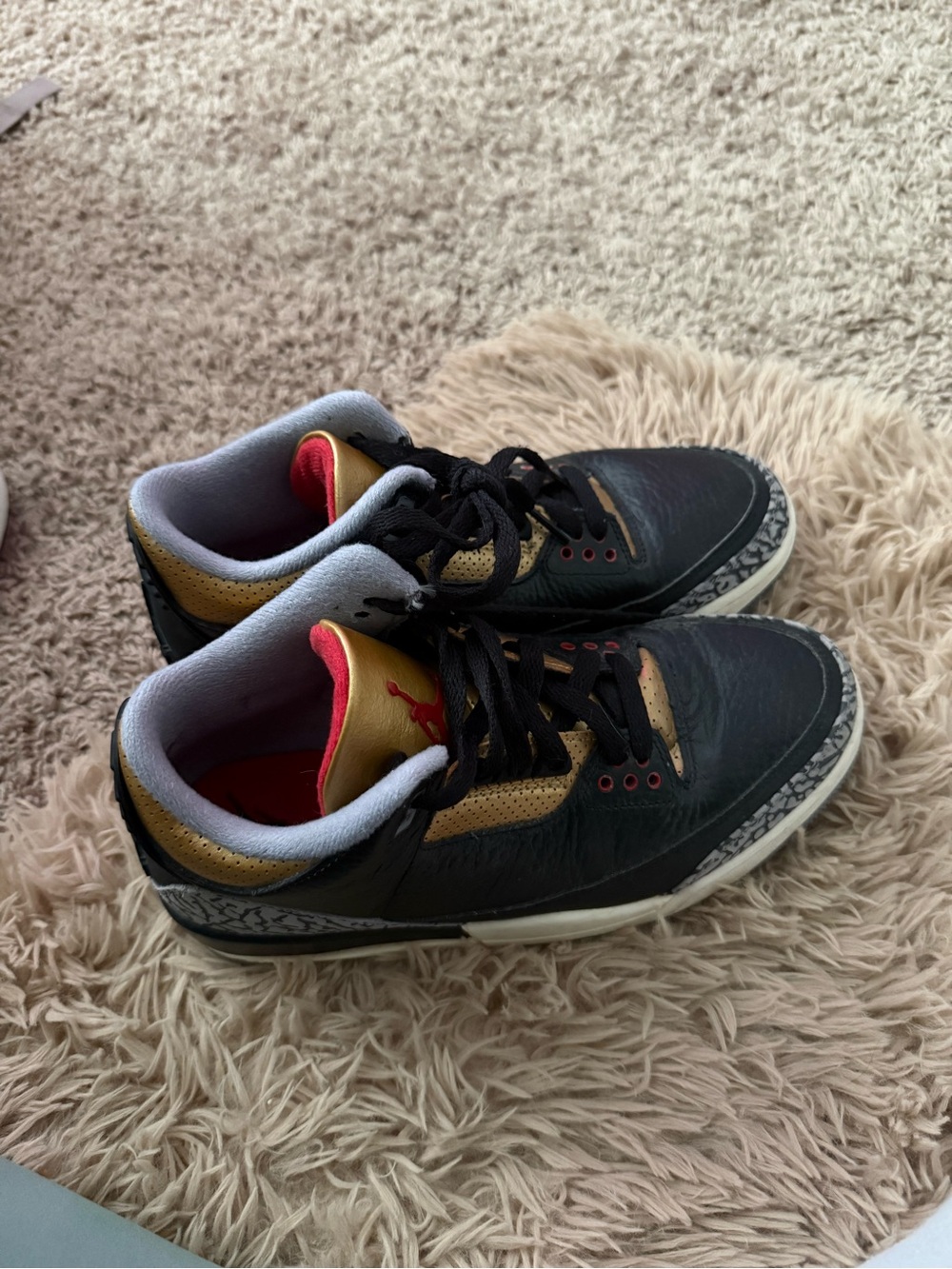 Jordan Men's Black and Gold Low-Top Sneakers with Red Accents